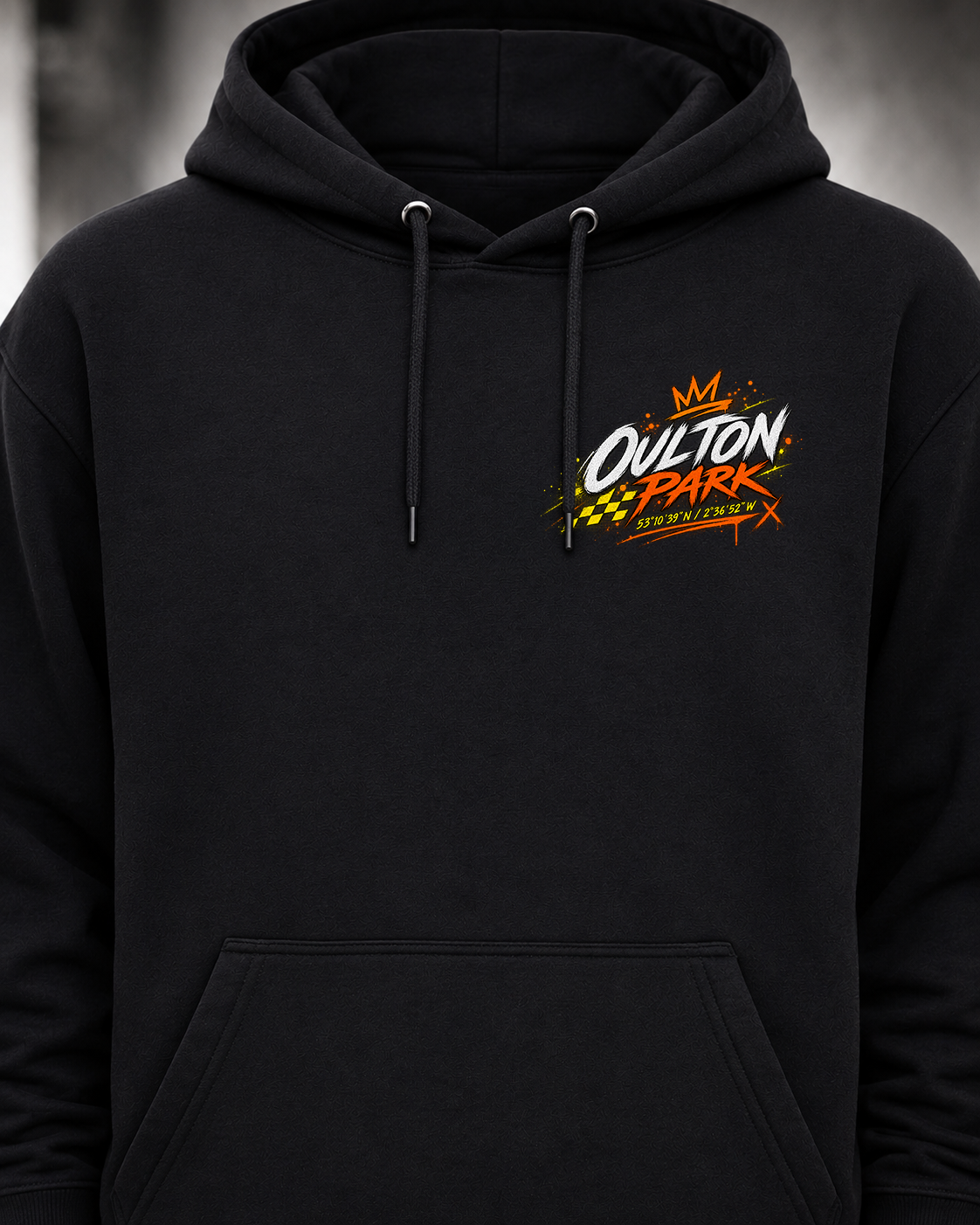 Front view of the black Oulton Park Track Hoodie