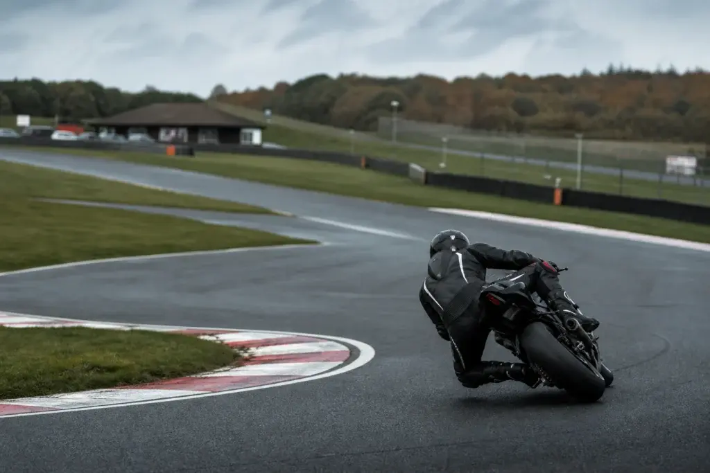 Motorcycle rider on a technical British race circuit